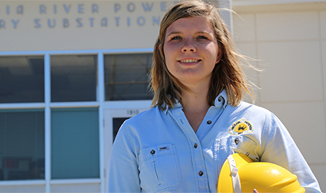 picture of Sadie standing with hard hat