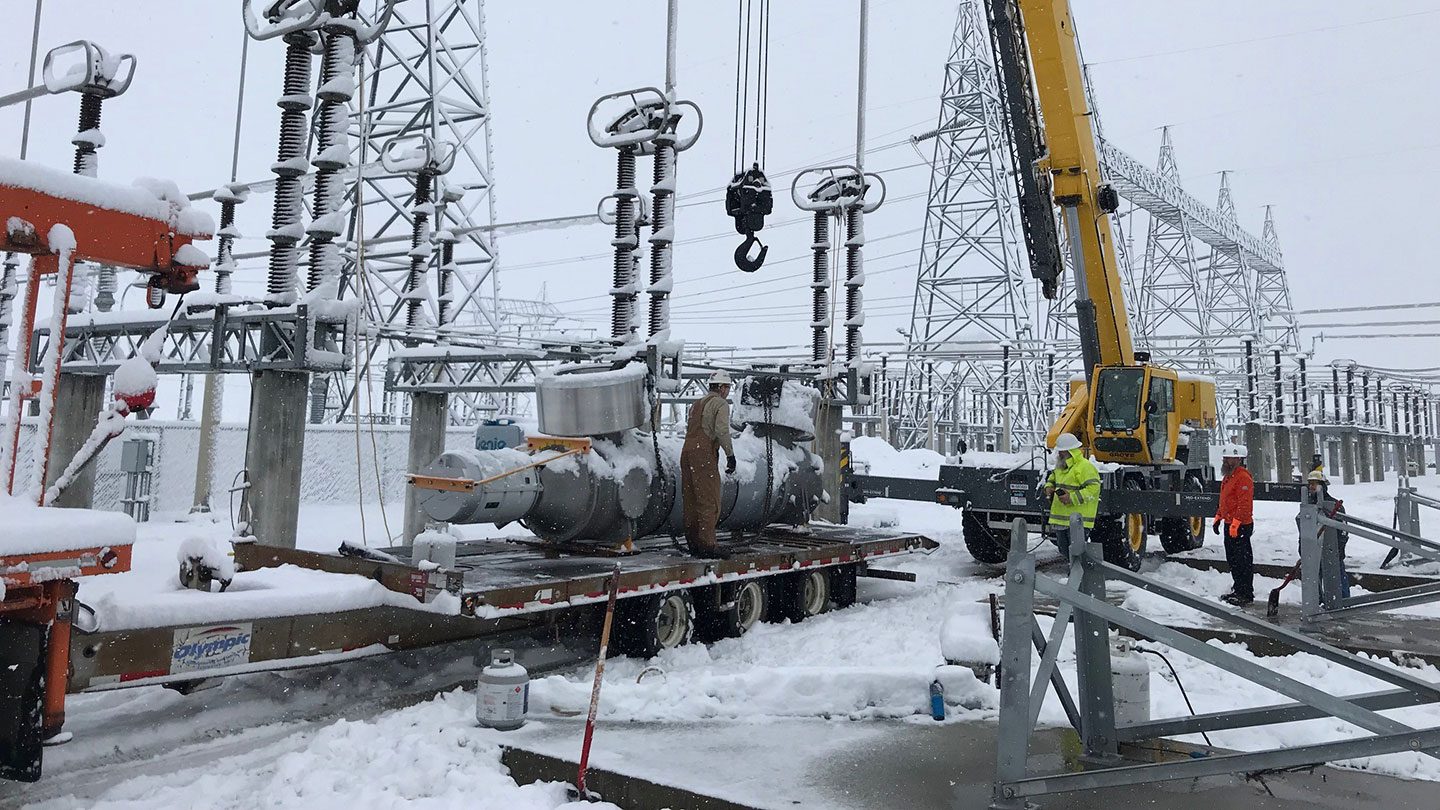 A Central Electrical Services construction crew worked through frigid temperatures as snow covered John Day Substation near The Dalles, Oregon, on Dec. 15, 2021.
