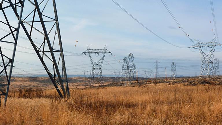 transmission towers in field