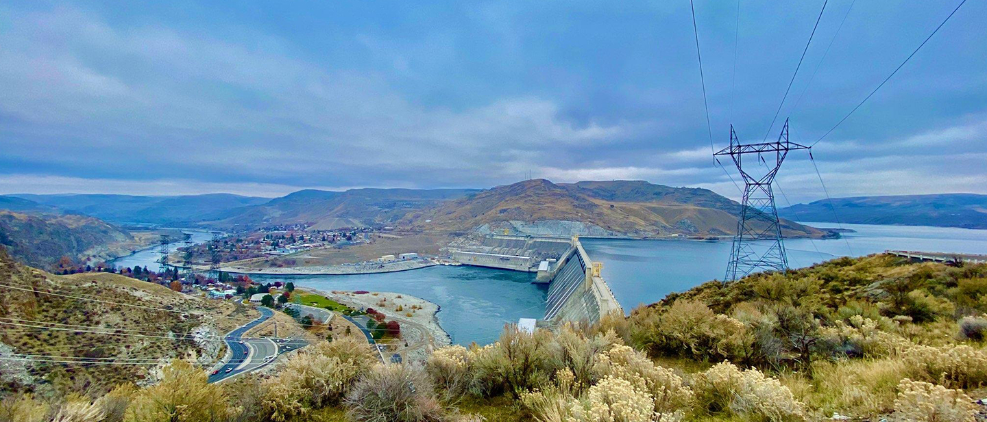 grand coulee dam with transmission towers