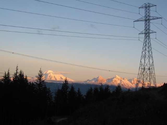 Image of power lines in front of scenery
